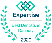 Award logo for "Best Dentists in Danbury 2020" by Expertise, featuring laurel wreath design.